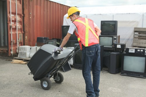 Supervisor checking vehicle and equipment